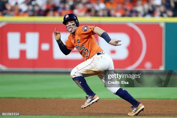 Jose Altuve of the Houston Astros steals second on a wild pitch in the sixth inning against the New York Yankees during game one of the American...