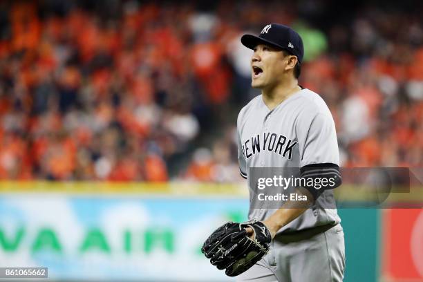 Masahiro Tanaka of the New York Yankees reacts in the sixth inning against the Houston Astros during game one of the American League Championship...