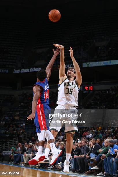 Milwaukee, WI Mirza Teletovic of the Milwaukee Bucks shoots the ball against the Detroit Pistons on October 13, 2017 at the BMO Harris Bradley Center...