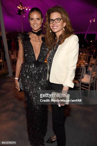 Model Heidi Klum and Desiree Gruber attend the amfAR Gala Los Angeles 2017 at Ron Burkle's Green Acres Estate on October 13, 2017 in Beverly Hills,...