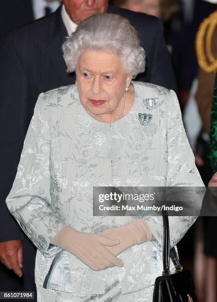 Queen Elizabeth II departs after attending a reception to mark the Centenary of the Women's Royal Navy Service and the Women's Auxiliary Army Corp at...