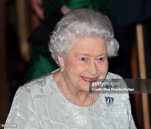 Queen Elizabeth II departs after attending a reception to mark the Centenary of the Women's Royal Navy Service and the Women's Auxiliary Army Corp at...