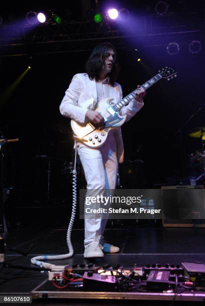 Photo of BRIGHT EYES and Conor OBERST; Conor Oberst performing live onstage at the Elserhalle, playing Gibson SG guitar, wearing white suit, with...