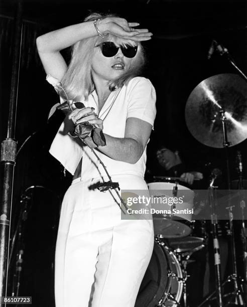 Debbie Harry of Blondie performs on stage holding a flower at the Whisky A Go Go, Los Angeles, California, United States, 1977.