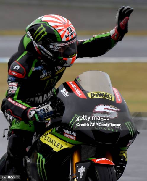Yamaha Tech3 rider Johann Zarco of France waves to fans at the end of the third practice round of the MotoGP Japanese Grand Prix at Twin Ring Motegi...