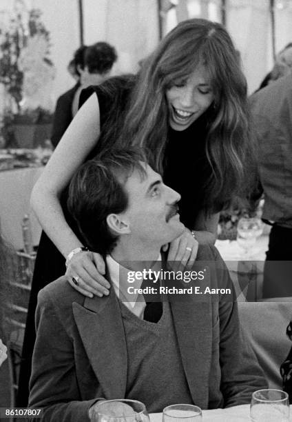 Photo of James TAYLOR and Carly SIMON, w/James Taylor during a press party for the Record Company