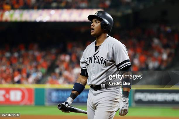 Starlin Castro of the New York Yankees reacts after striking out in the ninth inning against the Houston Astros during game one of the American...