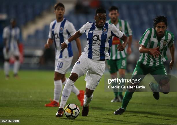Porto forward Hernani Fortes from Portugal with Lusitano Ginasio Clube defender Joao Nobre from Portugal in action during the Portuguese Cup match...