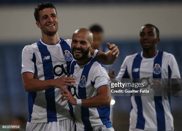 Porto defender Ivan Marcano from Spain celebrates with teammate FC Porto midfielder Andre Andre from Portugal after scoring a goal during the...