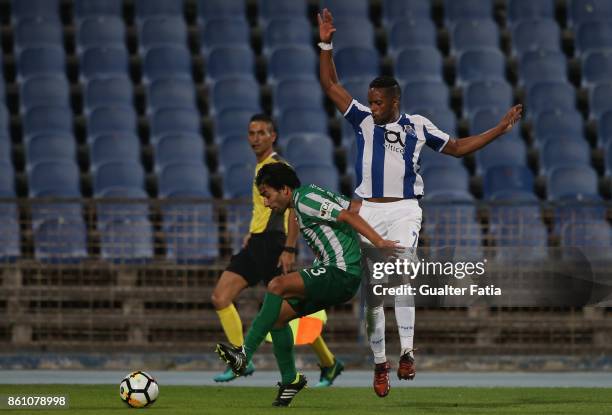 Lusitano Ginasio Clube defender Joao Nobre from Portugal with FC Porto forward Hernani Fortes from Portugal in action during the Portuguese Cup match...