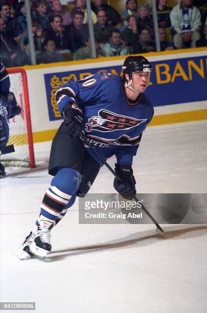 Joe Juneau of the Washington Capitals skates against the Toronto Maple Leafs during NHL game action on November 10, 1995 at Maple Leaf Gardens in...