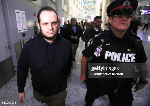 Joshua Boyle leaves after speaking to media. He and his wife Caitlain Coleman and their two sons, 4 and 2, and newborn daughter returned to Canada...