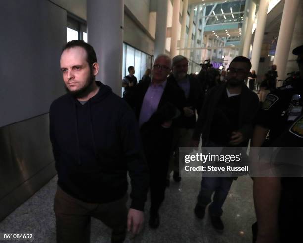 Joshua Boyle leaves after speaking to media. He and his wife Caitlain Coleman and their two sons, 4 and 2, and newborn daughter returned to Canada...