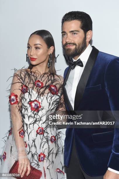 Cara Santana O and Jesse Metcalfe at amfAR Los Angeles 2017 at Ron Burkle's Green Acres Estate on October 13, 2017 in Beverly Hills, Californi