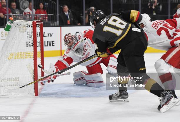 James Neal of the Vegas Golden Knights scores a second-period goal against Petr Mrazek of the Detroit Red Wings during their game at T-Mobile Arena...