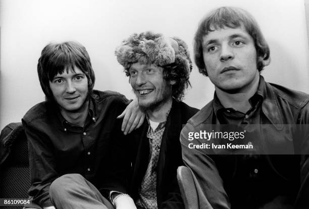 From left, Eric Clapton, Ginger Baker and Jack Bruce of British rock group Cream posed in their dressing room at Associated Rediffusion's Wembley...