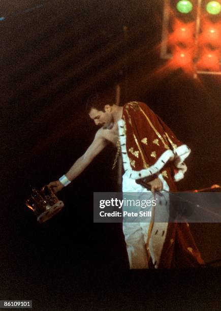 Photo of Freddie MERCURY and QUEEN, Freddie Mercury performing live on stage, in cape