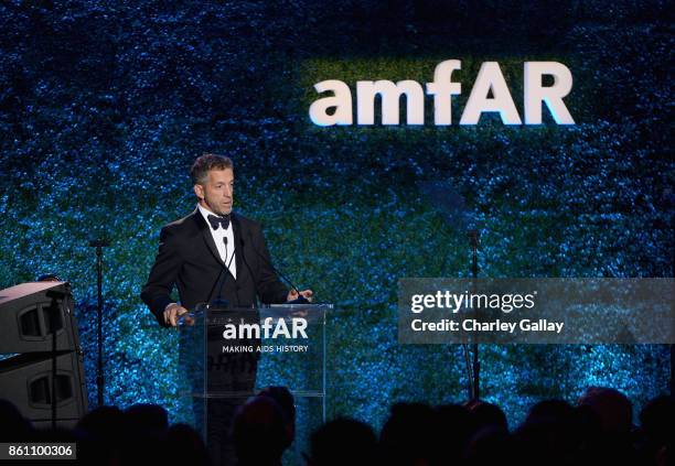 AmfAR chairman of the board Kenneth Cole speaks onstage during the amfAR Gala Los Angeles 2017 at Ron Burkle's Green Acres Estate on October 13, 2017...