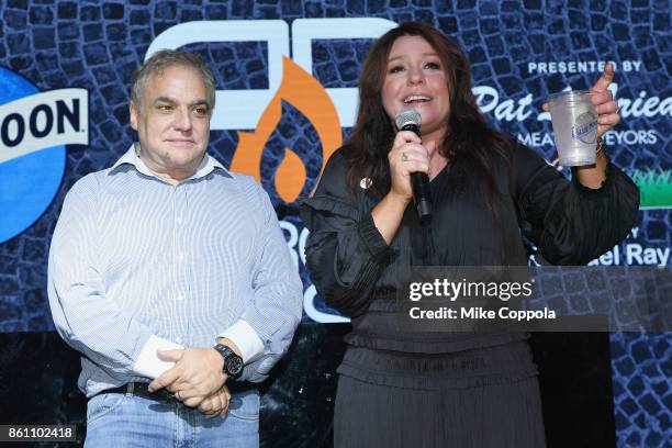 New York City Wine & Food Festival Founder & Executive Director Lee Brian Schrager and host Rachael Ray on stage at the Food Network & Cooking...