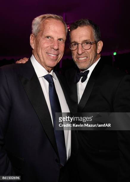 Steve Tisch and Kenneth Cole attend the amfAR Gala Los Angeles 2017 at Ron Burkle's Green Acres Estate on October 13, 2017 in Beverly Hills,...