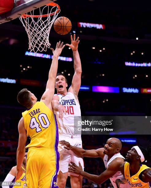 Marshall Plumlee of the LA Clippers attempts a shot over Ivica Zubac of the Los Angeles Lakers during a 111-104 Laker win at Staples Center on...