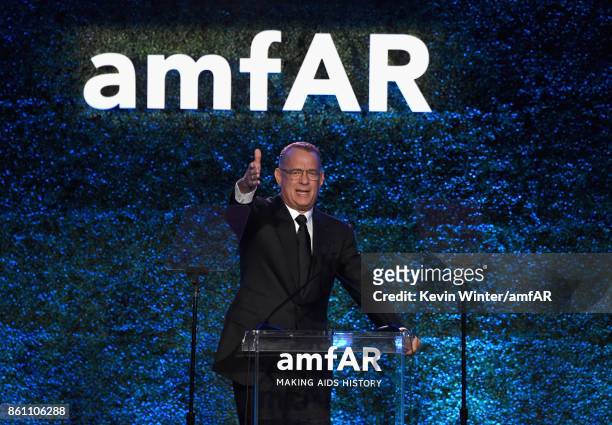 Tom Hanks speaks onstage at the amfAR Gala Los Angeles 2017 at Ron Burkle's Green Acres Estate on October 13, 2017 in Beverly Hills, California.