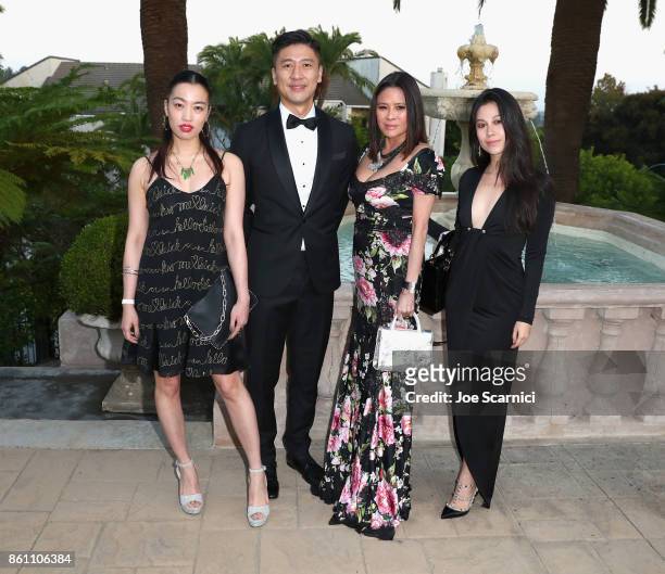 At AMTD Group Philip Yau and guests attend the amfAR Gala Los Angeles 2017 at Ron Burkle's Green Acres Estate on October 13, 2017 in Beverly Hills,...