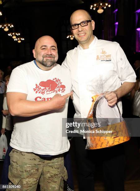 Chef and event host Duff Goldman poses for a photo with the winner, chef Ron Paprocki during Food Network & Cooking Channel New York City Wine & Food...