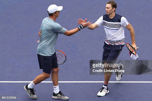 Henri Kontinen of Finland and John Peers of Australia celebrates after winning the Men's Doubles Semifinal mach against Jamie Murray of Great Britain...