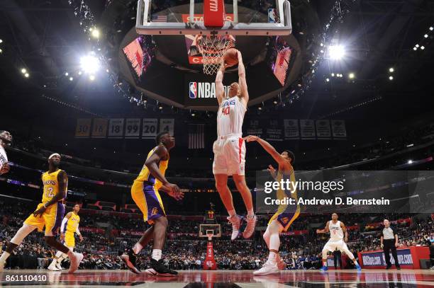 Marshall Plumlee of the LA Clippers goes up for a dunk against the Los Angeles Lakers on October 13, 2017 at STAPLES Center in Los Angeles,...
