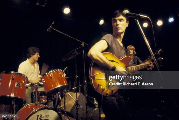 Photo of TALKING HEADS and Chris FRANTZ and David BYRNE and Tina WEYMOUTH; Chris Frantz , David Byrne and Tina Weymouth performing on stage