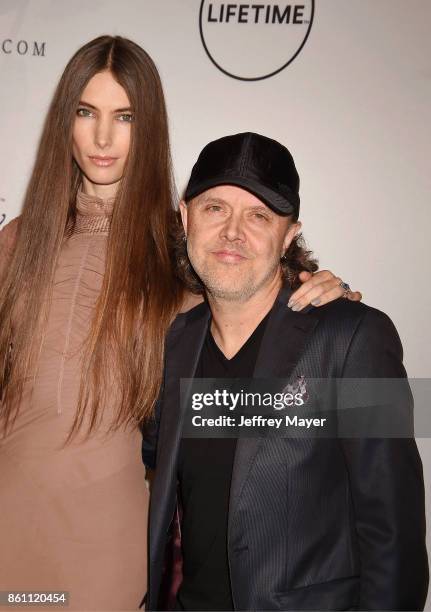 Musician Lars Ulrich and Jessica Miller arrive at the Variety's Power Of Women: Los Angeles at the Beverly Wilshire Four Seasons Hotel on October 13,...