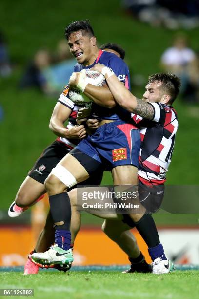 Peter Samu of the Tasman Makos is tackled during the round nine Mitre 10 Cup match between Counties Manukau and Tasman at ECOLight Stadium on October...