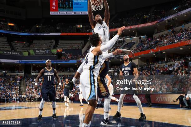Durand Scott of the Memphis Grizzlies dunks the ball during a preseason game against the New Orleans Pelicans on October 13, 2017 at FedExForum in...