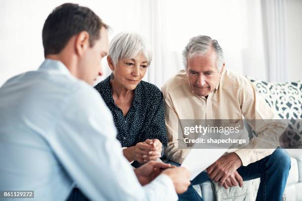 lang en hard te denken over hun financiële opties - life insurance stockfoto's en -beelden