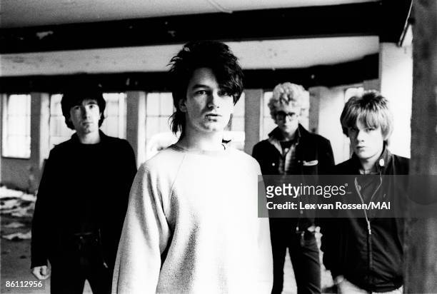Photo of U2, L-R: The Edge, Bono, Adam Clayton, Larry Mullen Jnr - posed, group shot