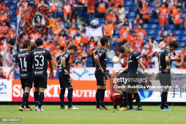 Gamba Osaka players show dejection after 0-1 lose in the J.League J1 match between Gamba Osaka and Albirex Niigata at Suita City Football Stadium on...