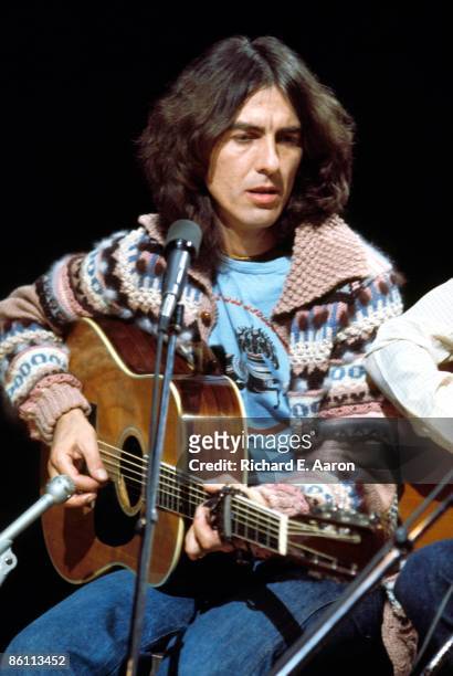 Photo of George HARRISON; performing on Saturday Night Live, playing acoustic guitar