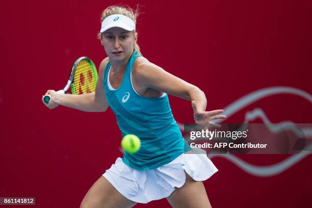Australia's Daria Gavrilova hits a return against Jennifer Brady of the US during their women's singles semi-final match at the Hong Kong Open tennis...