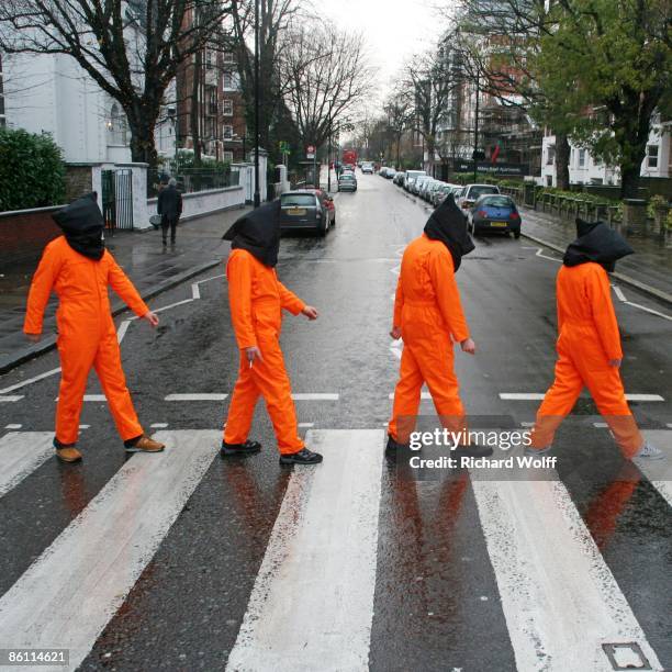 Photo of ABBEY ROAD, Close Guantanamo campaigners, crossing the famous zebra crossing on Abbey Road