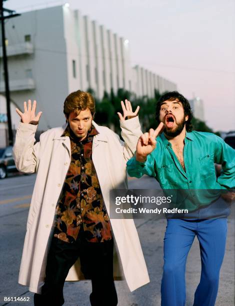 Photo of Bret McKENZIE and FLIGHT OF THE CONCHORDS and Jemaine CLEMENT; Posed studio group portrait of Bret McKenzie and Jemaine Clement