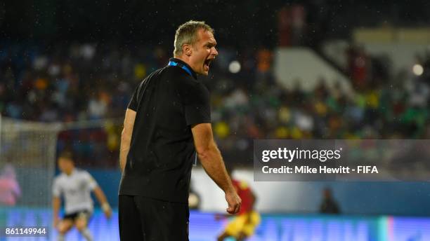 Germany coach Christian Wueck shouts instructions during the FIFA U-17 World Cup India 2017 group C match between Guinea and Germany at Jawaharlal...