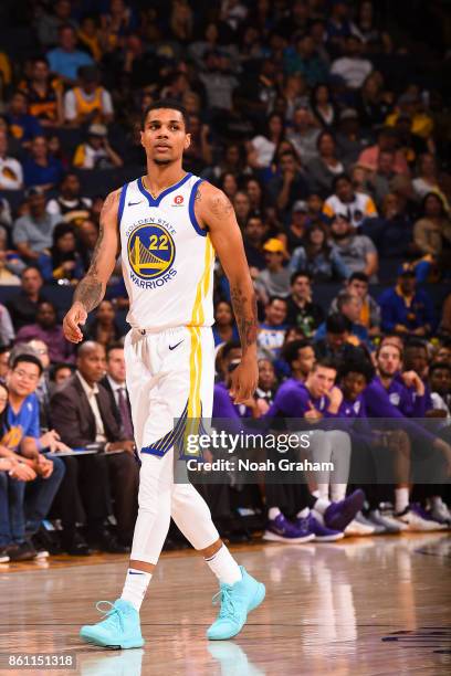 Michael Gbinije of the Golden State Warriors looks on during preseason game against the Sacramento Kings on October 13, 2017 at ORACLE Arena in...