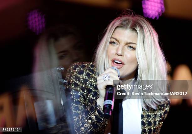 Fergie performs onstage at amfAR Los Angeles 2017 at Ron Burkle's Green Acres Estate on October 13, 2017 in Beverly Hills, Californi