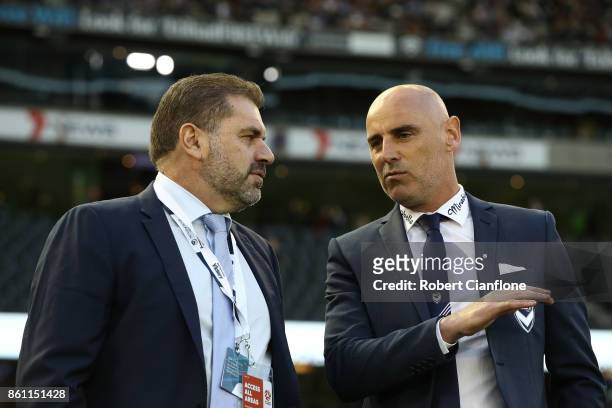 Socceroos coach Ange Postecoglou speaks with Victory coach Kevin Muscat prior to the round two A-League match between Melbourne Victory and Melbourne...