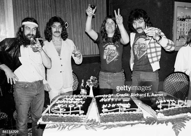 Photo of Ozzy OSBOURNE and BLACK SABBATH; L-R: Bill Ward, Geezer Butler, Ozzy Osbourne, Tony Iommi - posed, group shot, drinking, with tenth...