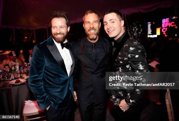 Ian Bohen, JR Bourne and Colton Haynes at amfAR Los Angeles 2017 at Ron Burkle's Green Acres Estate on October 13, 2017 in Beverly Hills, Californi