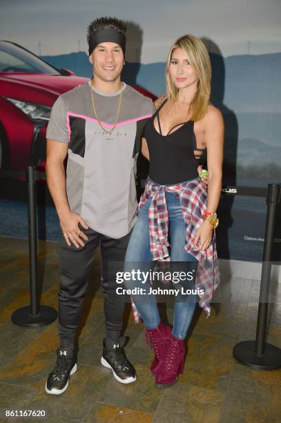 Chyno Miranda and wife Natasha Araos attend J Balvin Energia concert Tour at the AmericanAirlines Arena on October 13, 2017 in Miami, Florida.