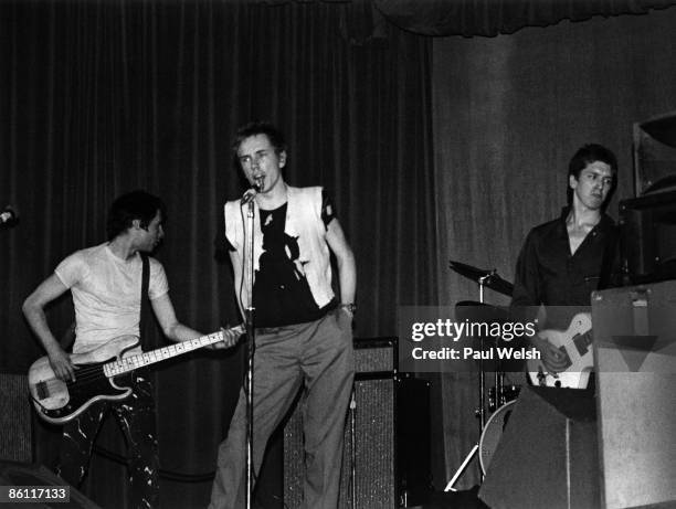 Photo of Steve JONES and Johnny ROTTEN and Glen MATLOCK and SEX PISTOLS, L-R Glen Matlock, Johnny Rotten and Steve Jones performing on stage