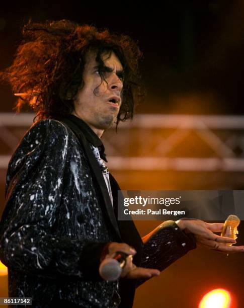 Photo of Jimmy URINE and MINDLESS SELF INDULGENCE, Jimmy Urine performing on stage, eating, food